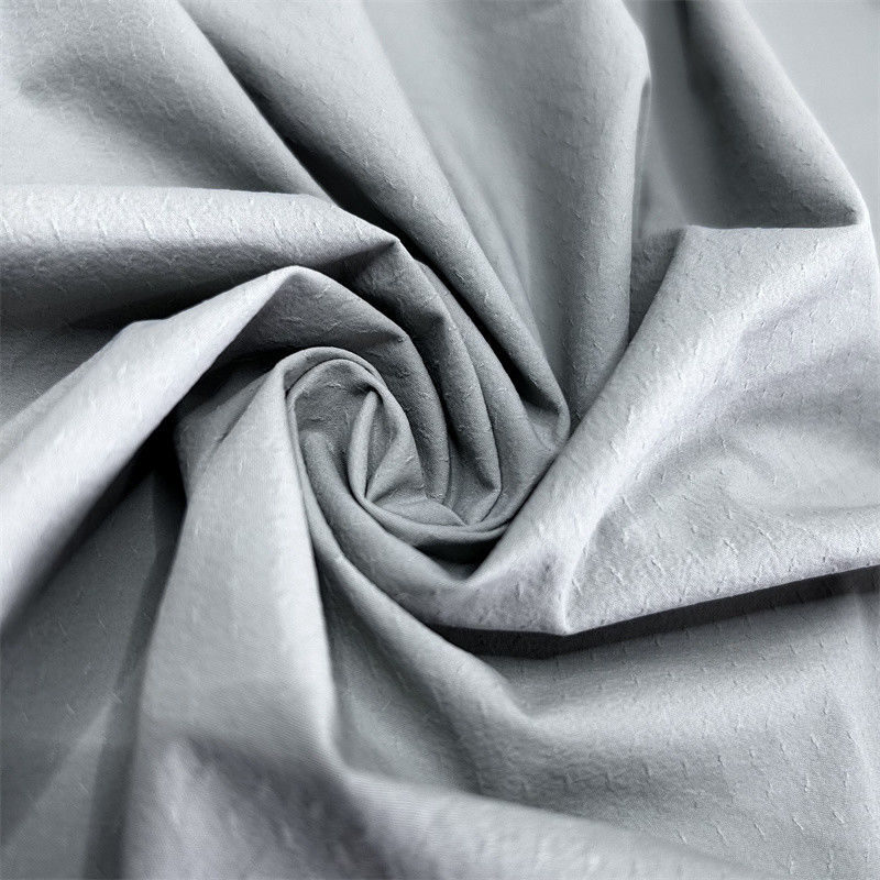 70D+40D*70D+40D Τριδιάστατο φαινόμενο Twill Jacquard για πουκάμισα Νερά μπουφάν