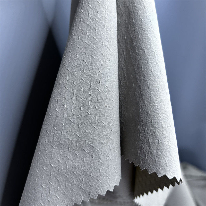 70D+40D*70D+40D Τριδιάστατο φαινόμενο Twill Jacquard για πουκάμισα Νερά μπουφάν